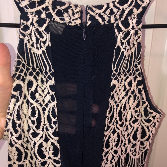 A navy dress w/ white embroidery and a sheer back - Picture 4 of 5